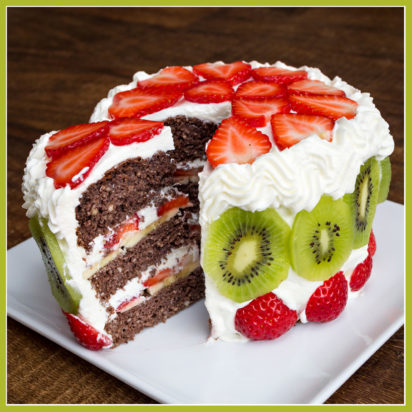 Fancy cake with strawberries and Kiwi - cut