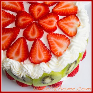 Strawberries and Kiwi on a fancy cake - from top
