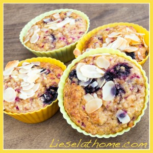 4 gluten free muffins with blueberries and raspberries