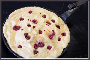 Batch of Kaiserinschmarrn with raspberries in a pan