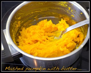 a pot with mashed pumpkin with butter