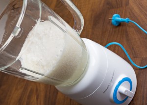 blender with coconut and water